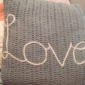 Cute knit love pillow from Marshall’s in teal